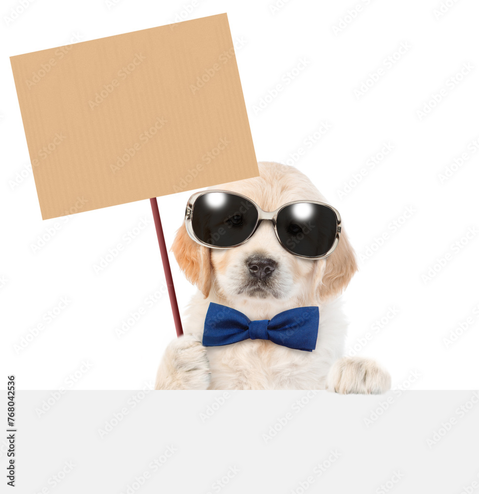 Aufkleber funny smart golden retriever puppy wearing sunglasses and tie bow shows empty placard above empty wh