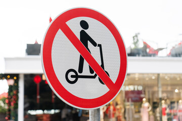 Road sign prohibiting riding electric scooters. Prohibiting sign for electric scooters. Road sign prohibiting the movement of scooters. 