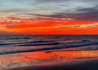 Orange and red sunrise over St. Augustine Beach in Florida