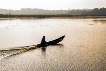 fisherman boat on the amazon lake amazon people