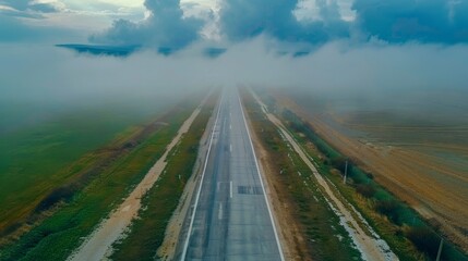  Isolation of straight highway road with clouds