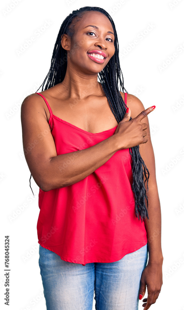 Poster Young african american woman wearing casual clothes cheerful with a smile of face pointing with hand and finger up to the side with happy and natural expression on face