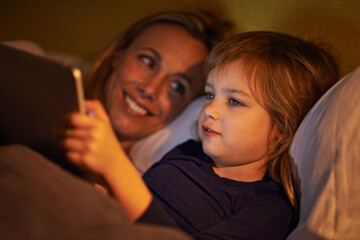 Night, mother or kid with tablet for streaming, playing games or watching videos on movie website...