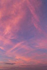 Pink purple violet blue cloudy sky. Beautiful epic sunrise, sunset with cirrus clouds abstract background texture