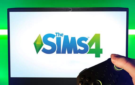 Gamer plays Sims 4 with a gamepad. Stock editorial photo. Ukraine. Kiev. 04.14.2024
