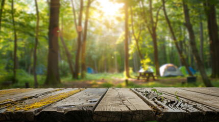 Wooden Platform in Forest Campsite with Tents in Background