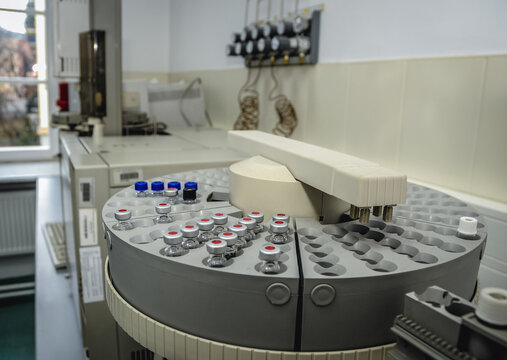 Sample vials on Gas Chromatograph autosampler in a police forensic laboratory in Warsaw city, Poland