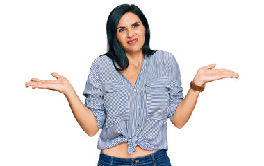 Young caucasian woman wearing casual clothes clueless and confused with open arms, no idea concept.
