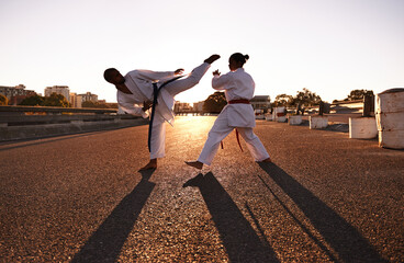 People, karate and fitness with personal trainer in city street for self defense, fighting...