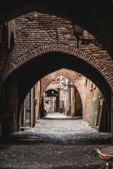 Fototapeta premium old stone arch in Ferrara in Italy