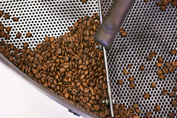 Coffee beans, machine and industry in factory for roast, grinding or product for flavor, export or...