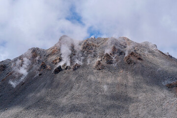 White smoke billowing out of the  apex of throut of the Chaiten Volcano is actually a mix of mostly water vapor, carbon dioxide, and sulfur gases. Location: Chaitén Los Lagos, Chile