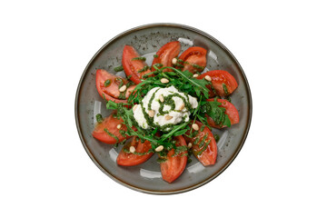 tomatoes with stracciatella and herbs on a plate, cut out, top view
