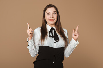 Happy Young Woman Indicating with Fingers up for Your Advertisement, recommending click on link, demonstrating promo banner