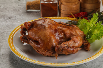 Baked small chicken with spices