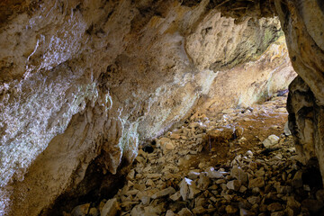 cave in karst with sunlight coming in