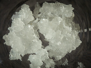 Grown crystals in bright light. Potassium pyrosulphite. A substance used in the food industry....