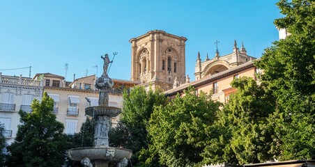 Fototapeta na wymiar A water fountain in the cathedral church in Granada, Spain