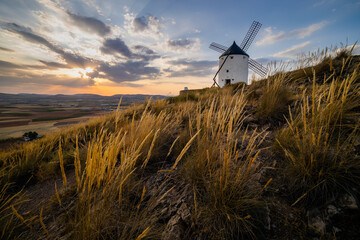 Windmills at sunset in Consuegra, Castile-La Mancha, Spain - obrazy, fototapety, plakaty