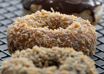 Close up view of a toasted coconut donut