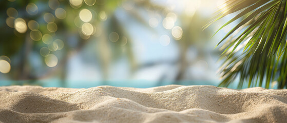 A serene beach scene framed by palm leaves, focusing on the textured sand illuminated by soft...