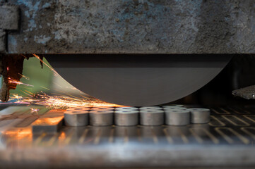Finishing metal working on horizontal surface grinder machine. High quality photo