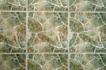 Ceramic tiles imitating stone wall close up