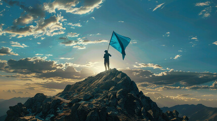 A man standing on top of a mountain holding up a blue flag with his hand