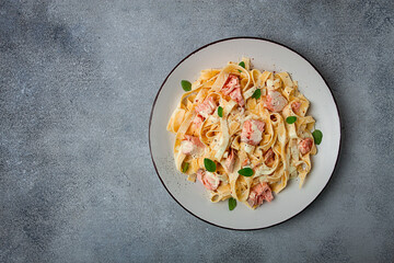 tagliatelle pasta, in cream sauce with salmon, homemade, no people,