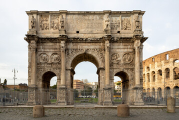 Fototapeta na wymiar Arch of Constantine next to the Colosseum in Rome, Italy