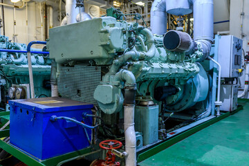 Marine engine. Diesel generator. Engine room interior.