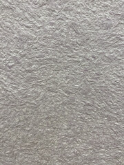 Silk plaster or liquid wallpaper. The coating is made on the basis of cellulose of different colors. Background