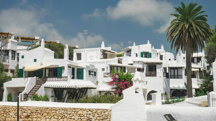 The picturesque Binibeca Village (Binibequer Vell) in Menorca Island Spain and its unique architecture with traditional white houses