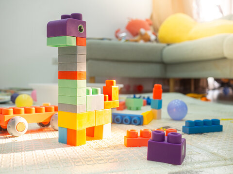 Toys to enhance the development of colorful rubber blocks that can be assembled into various shapes according to the child's imagination. Placed on the children's play area.