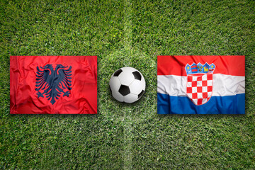 Albania vs. Croatia flags on soccer field © BirgitKorber
