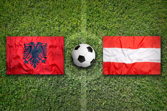 Albania vs. Austria flags on soccer field