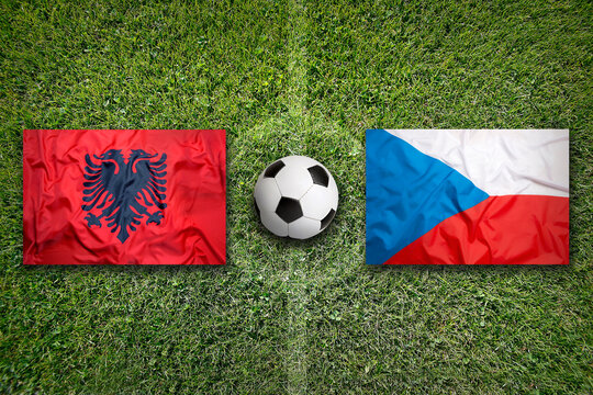 Albania vs. Czech Republic flags on soccer field