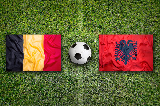 Belgium vs. Albania flags on soccer field