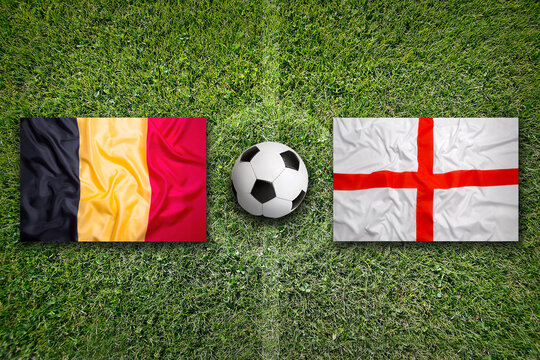 Belgium vs. England flags on soccer field