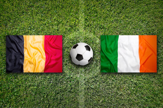 Belgium vs. Ireland flags on soccer field
