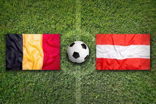 Belgium vs. Austria flags on soccer field