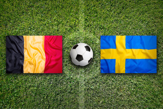 Belgium vs. Sweden flags on soccer field