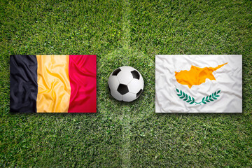 Belgium vs. Cyprus flags on soccer field
