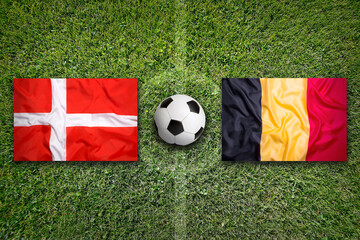 Denmark vs. Belgium flags on soccer field