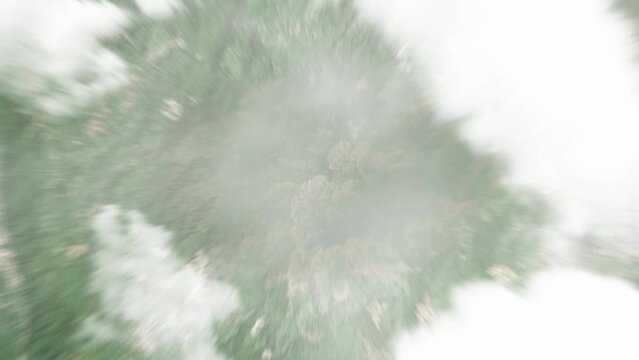 Earth zoom in from space to Phongsali, Laos. Followed by zoom out through clouds and atmosphere into space. Satellite view. Travel intro. Images from NASA