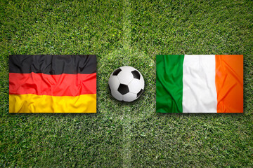 Germany vs. Ireland flags on soccer field