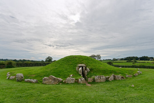 Bryn Celli Ddu Neolithic passage tomb mound. Anglesey, Wales. Passage entrance within henge and stone kerb. Earlier Mesolithic postholes dated 4000BC