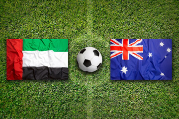 United Arab Emirates vs. Australia flags on soccer field