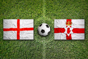 England vs. Northern Ireland flags on soccer field