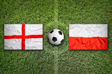 England vs. Poland flags on soccer field